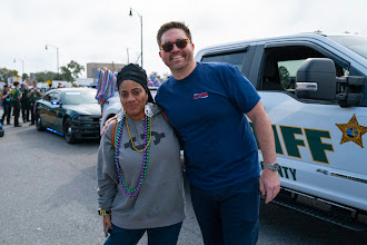 Mayor Reeves with a resident at a community parade